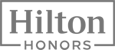 The image shows the Hilton Honors logo, with "Hilton" in large letters above "HONORS" in smaller letters, enclosed in a rectangular border.