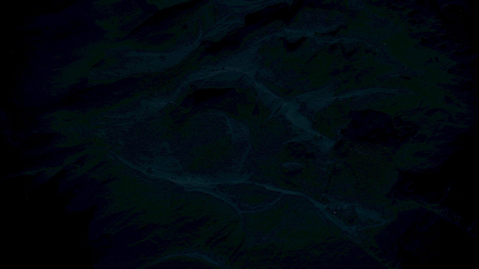 The image is too dark to determine details clearly. Brightness adjustment might be needed for better visibility and analysis.